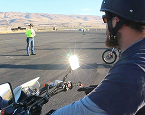 Light reflecting off of motorcycle mirror
